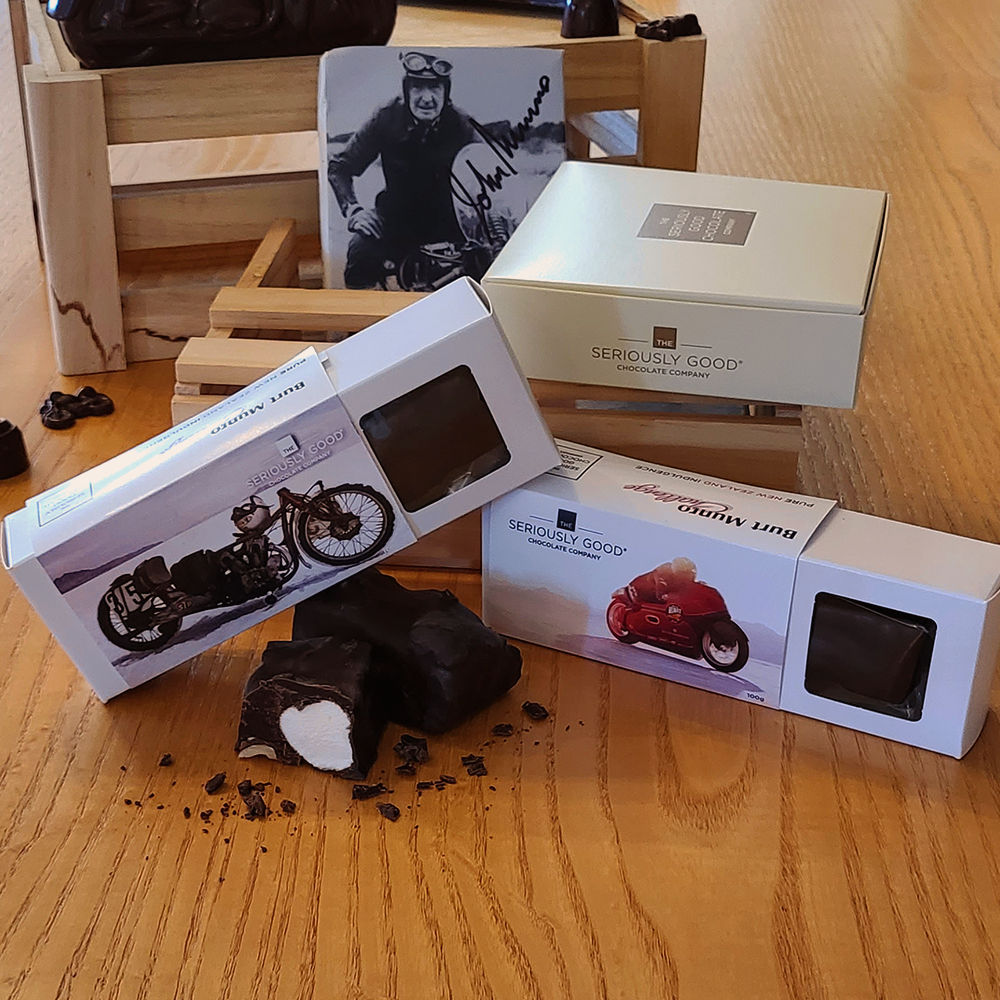 The Seriously Good Chocolate Company Dark Chocolate Rocky Road Box and Log Bar Burt Munro Edition Black & Red Duo Display