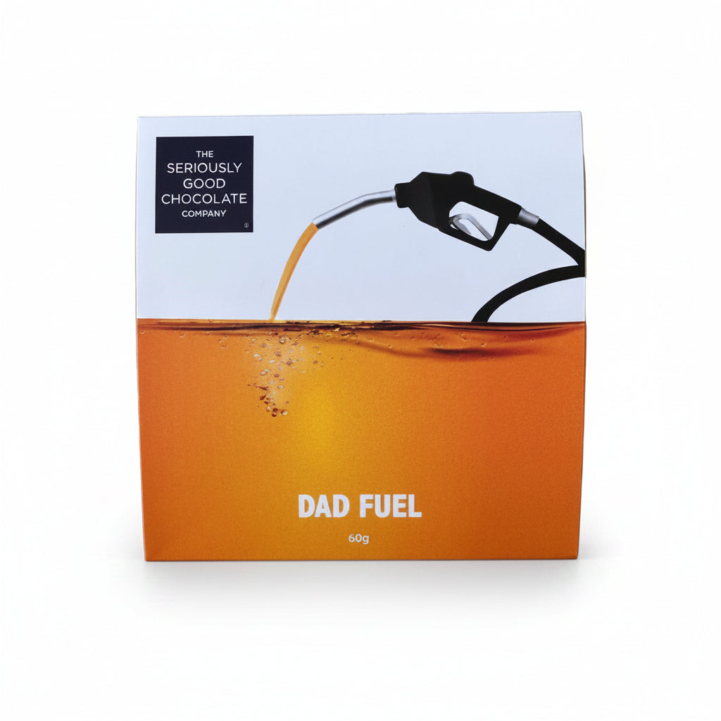 A square chocolate bar package labeled 'DAD FUEL' by The Seriously Good Chocolate Company. The box design shows an orange liquid being poured from a fuel nozzle into a container, with a white upper section and black text.