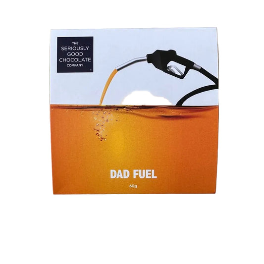A square chocolate bar package labeled 'DAD FUEL' by The Seriously Good Chocolate Company. The box design shows an orange liquid being poured from a fuel nozzle into a container, with a white upper section and black text.