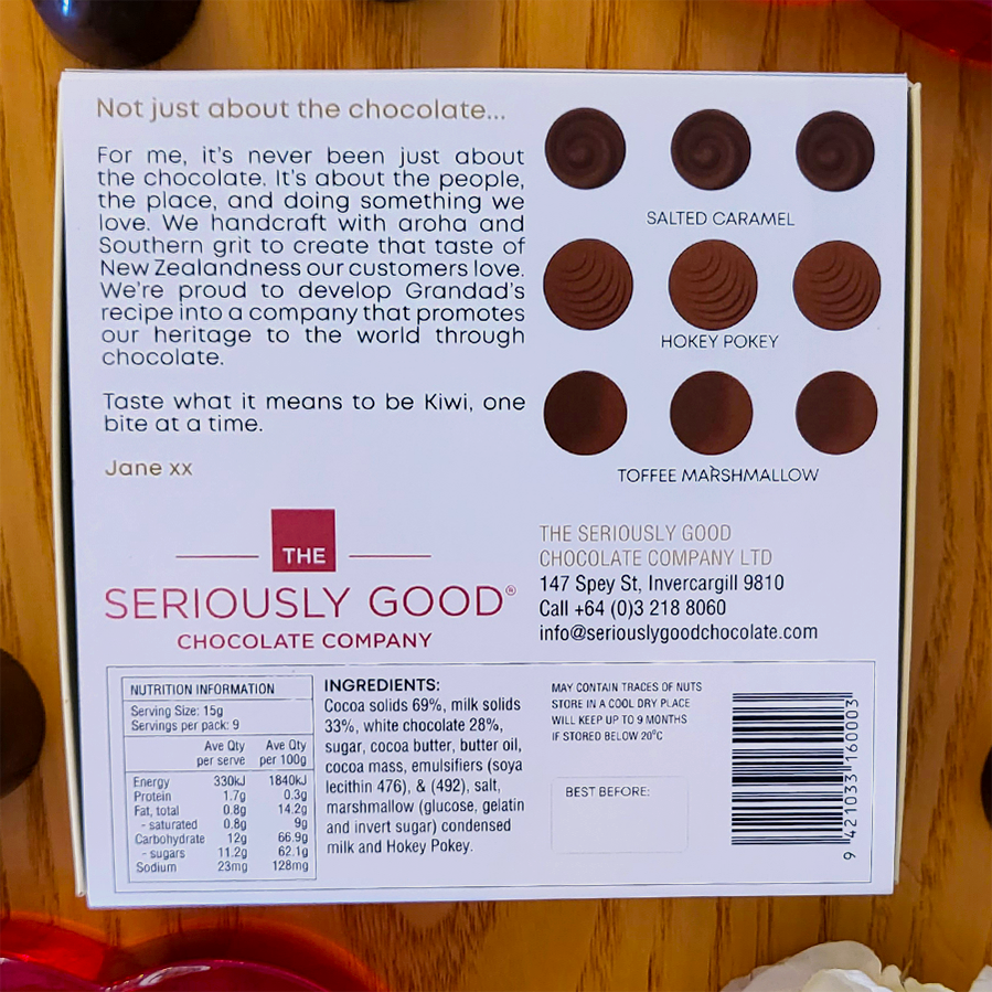 Back of the Box of The Seriously Good Chocolate Company 9 Piece Indulgent Artisan Chocolates Rick Astley Collection Handmade in Southland NZ showing product information. Decorated with glass hearts, white roses and chocolate