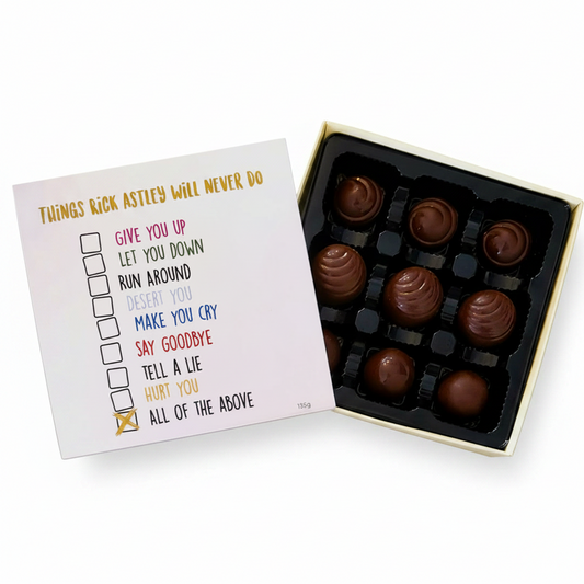 Open Box of The Seriously Good Chocolate Company 9 Piece Indulgent Artisan Chocolates Rick Astley Collection Handmade in Southland NZ decorated with glass hearts, white roses and chocolate