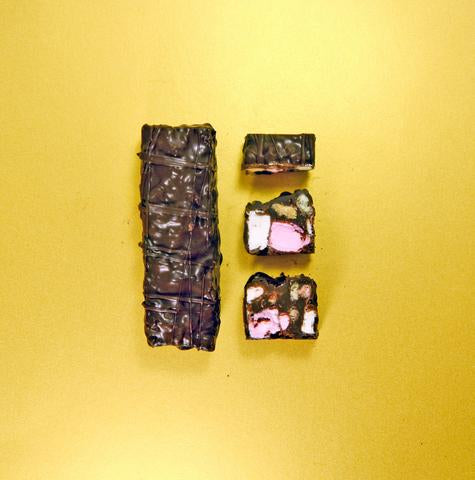 The Seriously Good Chocolate Company Dark Chocolate Rocky Road Log Bar Whole and Sliced on Gold Background