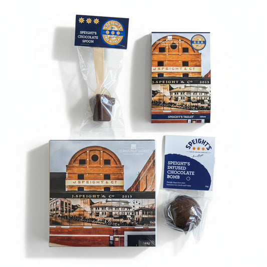 Packaging of Speight's beer infused products featuring a chocolate spoon, beer bomb, and tablets, with a background image of a Speight's brewery.